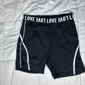 Shein black and white love biker shorts. Never worn. Only tried on.